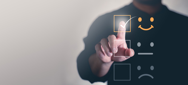 Patient, including men or woman, using self registration system to check in. 